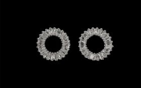 Diamond Open Circle Stud Earrings, each a circle of baguette cut diamonds, making a total est.