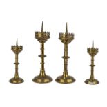 A Pair of Brass 19th Century Neo-Gothic Pricket Church Candlesticks. Measures 15" high.