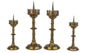A Pair of Brass 19th Century Neo-Gothic Pricket Church Candlesticks. Measures 15'' high.