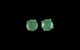 Emerald Pair of Stud Earrings, round cut solitaire emeralds of beautiful colour,
