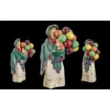 Royal Doulton Early Hand Painted Porcelain Figure ' The Balloon Seller ' Green and Cream Colour way,