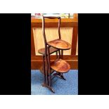 Early 20th Century Mahogany Folding Four Tier Cake Stand, double sided, measures 30" tall.