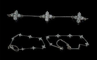 Ladies 18ct White Gold Elegant and Superb Diamond Set Bracelet with seven diamond set flower