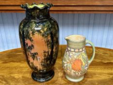 Charlotte Rhead Jug/Vase, decorated with fruit and flowers, measures 9.5" high.