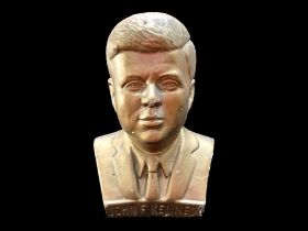 Plaster Bust of John F Kennedy, gold tone, named to front of bust. Measures approx.