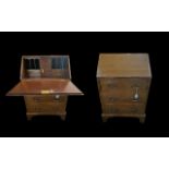 Small Walnut Bureau, with pull down front to reveal inner four small drawers,