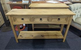 A Pine Occasional/Hallway Table Three Drawers with storage space underneath. Measures 45½ inches