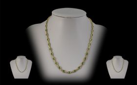 Ladies 18ct Gold Attractive and Excellent Quality Peridot Set Necklace, Marked 750 - 18ct.