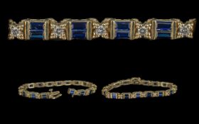 Ladies 9ct Gold Pleasing Sapphire and Diamond Line Bracelet, Marked 9ct -375. Sapphires and Diamonds
