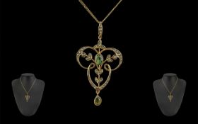 Edwardian Period 1901 - 1910 9ct Gold Open Worked Pendant Drop, Set with Peridots and Seed Pearls.
