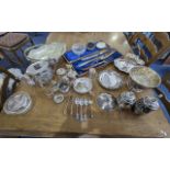 Collection of Silver Plated Ware, comprising teapots, vases, cups, serving knives and forks, etc.