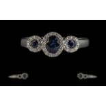 18ct White Gold - Superb Quality and Contemporary Sapphire and Diamond Set Dress Ring.