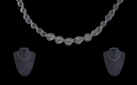 Ladies 18ct White Gold Attractive Diamond Set Necklace, stamped 750 - 18ct, the five round brilliant