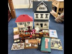 Two Doll's Houses, both with accessories,