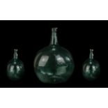 Large Antique Green Glass Wine Bottle/Vase, measures approx. 19th high x 14" wide, oval shape.