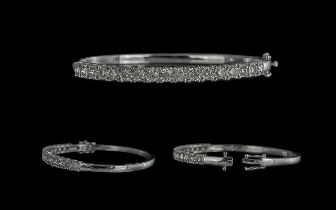 9ct White Gold Hinged Bangle set with 2.