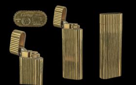 Cartier - Paris Deluxe Gold Plated Lighter, of Ribbed Design. Ref No 48928. 2.3/4 Inches - 6.