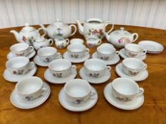 Two Children's China Tea Sets, comprising tea pots, milk jugs, sugar bowls, cups and saucers,
