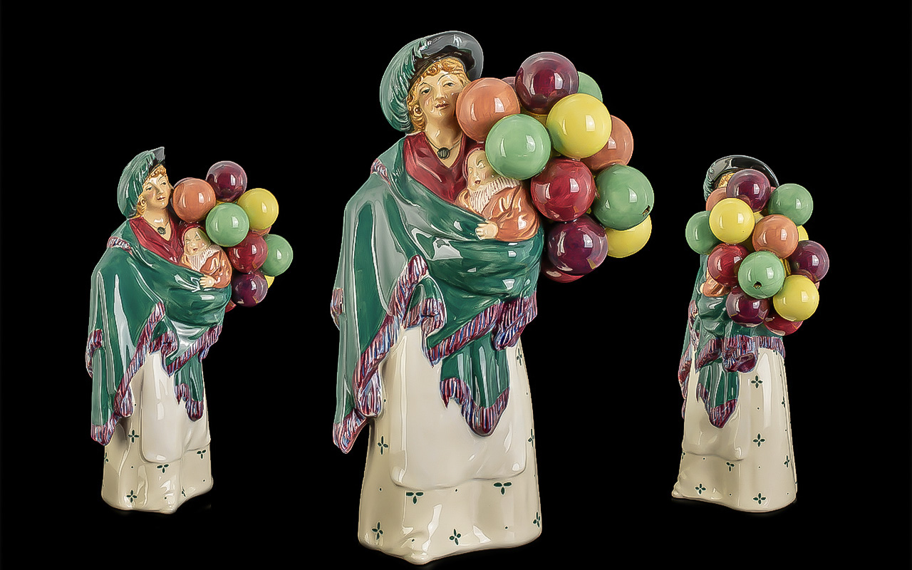 Royal Doulton Early Hand Painted Porcelain Figure ' The Balloon Seller ' Green and Cream Colour way,