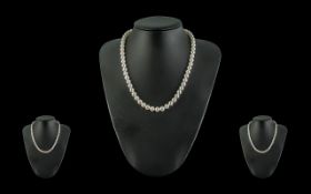 Tiffany & Co. Pearl Necklace, single strand, with 18ct white gold clasp. Marked Tiffany & Co. on