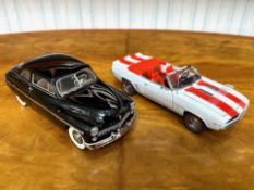 Two Danbury Mint Collector's Classic Cars, 1969 Chevrolet Camaro SS in red and white, and a 1949