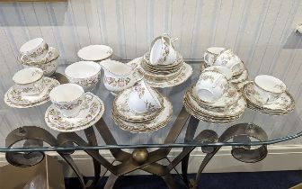 Collection of Bone China, including tea cups, saucers, bread and butter plates, side plates, milk