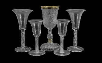 Collection of Antique Glasses, comprising seven 9'' tall twist stem liqueur glasses, four 9'' tall