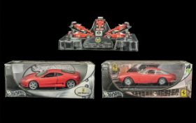Ferrari Racing Car Interest. 4 * Hot Wheels 1:18 Scale Ferrari models comprising Michael Schmacher