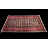 Red Ground Persian Bluchi Full Pile Nomadic Rug, measures 270 x 131.