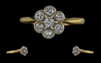 18ct Gold and Platinum Diamond Set Cluster Ring, Flower head Design. Marked 18ct and Platinum to