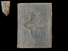 Large Victorian Family Bible, in leather embossed cover, with brass fittings. Measures 10'' x 13''.