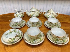 Japanese Porcelain Tea Service to include, cups, saucers, side plates, tea pot, sugar etc.