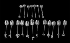 Collection of Antique Small Silver Spoons, with decorative tops depicting animals, birds, fish,