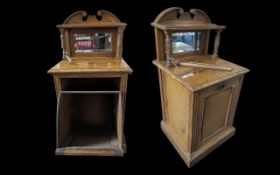 A Victorian Walnut Purdonium, also known as a coal scuttle cabinet or coal hod, top shelf above