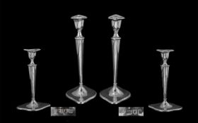 Edwardian Period Pair of Sterling Silver Candlesticks of excellent form, hallmarked London 1910,