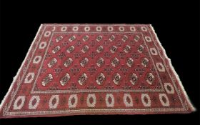 Rich Full Pile Turkmann Double Knot Carpet, traditional Bukari design, measures 290 x 220.