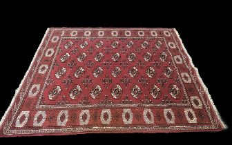 Rich Full Pile Turkmann Double Knot Carpet, traditional Bukari design, measures 290 x 220.