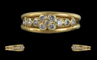 18ct Gold Attractive Diamond Set Ring with openwork setting, marked 18ct to the shank, the round,