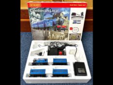 Hornby Caledonian Local Electric Train Set, boxed as new.