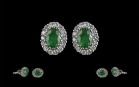 Pair of 18ct White Gold Oval Emerald and