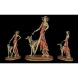 Modern Decorative Figure of a Glamorous Lady Walking her Dog, measures 18'' tall, 12'' wide, mounted