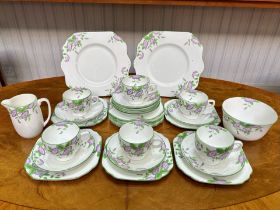Gladstone Porcelain Tea Set, comprising six cups, 10 saucers,11 side plates, milk jug, sugar bowl