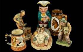 Box of Miscellaneous Items - including three decorative figurals, a Toby Jug, and two tankards.