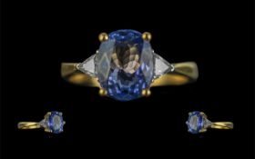 18ct Gold Attractive Tanzanite and Diamond Set Dress Ring, full hallmark to interior of shank, the