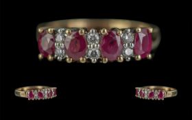 Ladies 18ct Gold Ruby and Diamond Set Ring. Full Hallmark to Shank. The Four Rubies of Excellent