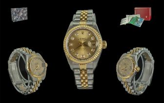 Rolex Ladies 18ct Gold - Steel Oyster Perpetual Datejust Wrist Watch with diamond set markers, Model