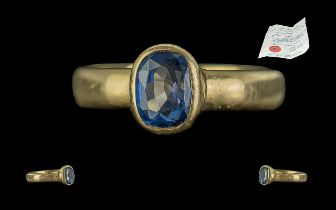 18ct Gold - Excellent Quality Single Stone Blue Sapphire Set Band Ring. Marked 750 - 18ct to