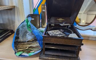 An Early 20th Century Table Top Portable Gramaphone, made in England by Colombia, together with a
