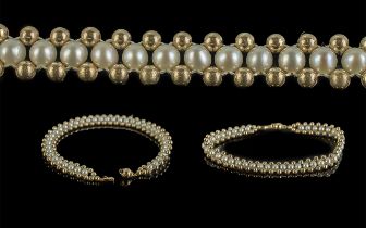 Ladies - Attractive and Pleasing 9ct Gold and Pearl Bracelet. Stamped 9.375. The Well Matched Pearls