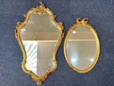 Two Decorative Gilt Framed Oval Mirrors, one Rococo style measures 34'' x 21'', the other with